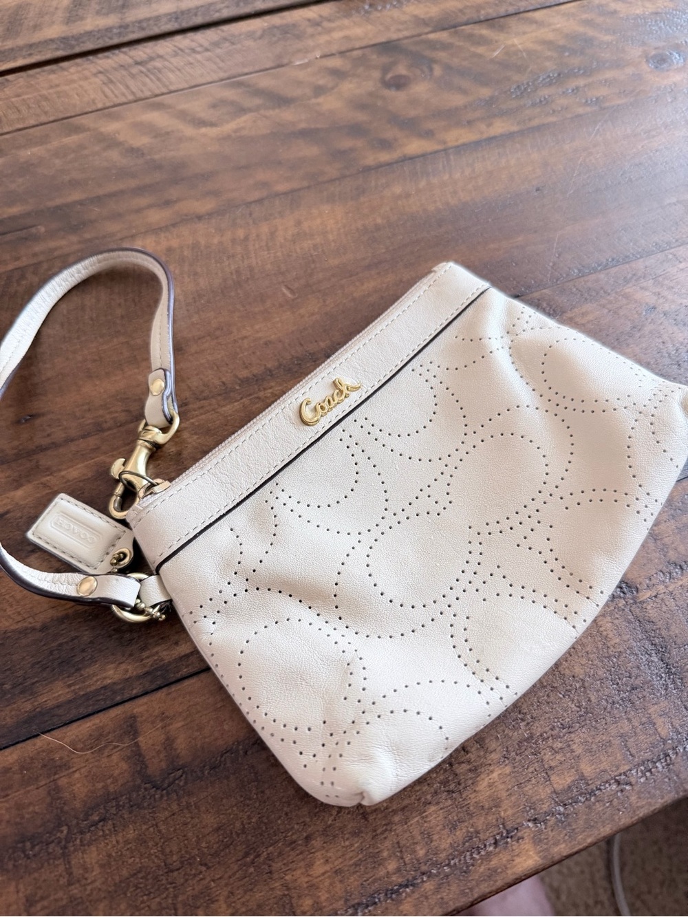 Coach Perforated Leather Wristlet in Cream with Gold Hardware